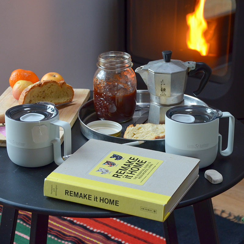 12oz-rise-mug-p7 12oz_rise_coffee_mug_barely_blue_table_woodstove_square.jpg