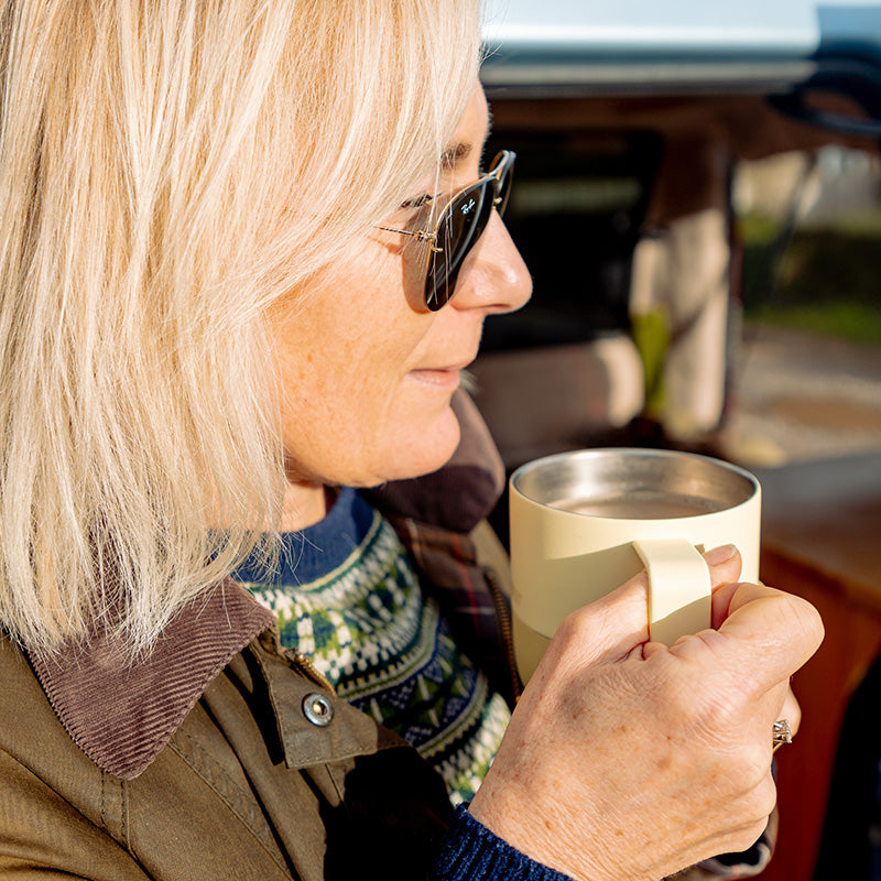 12oz-rise-mug-p7 12oz_rise_coffee_mug_wax_yellow_woman_drink_closeup_square.jpg